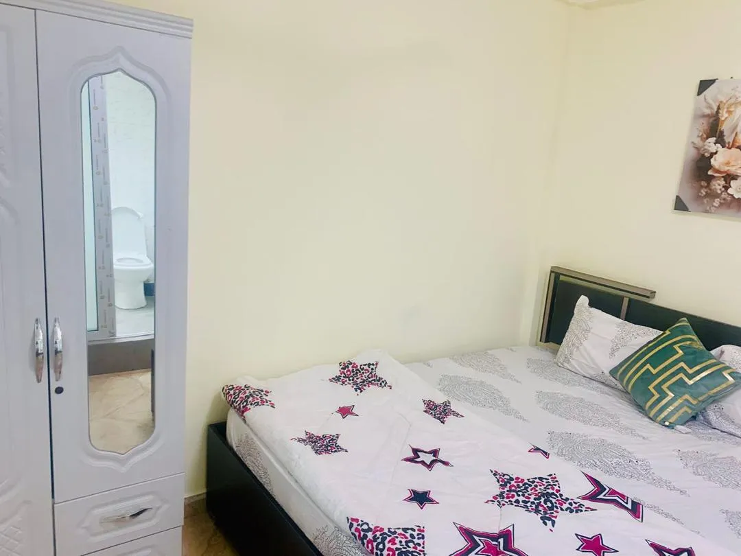Spintex Urban Nest – Stylish 1BR with Pool, Gym & Rooftop Bar
